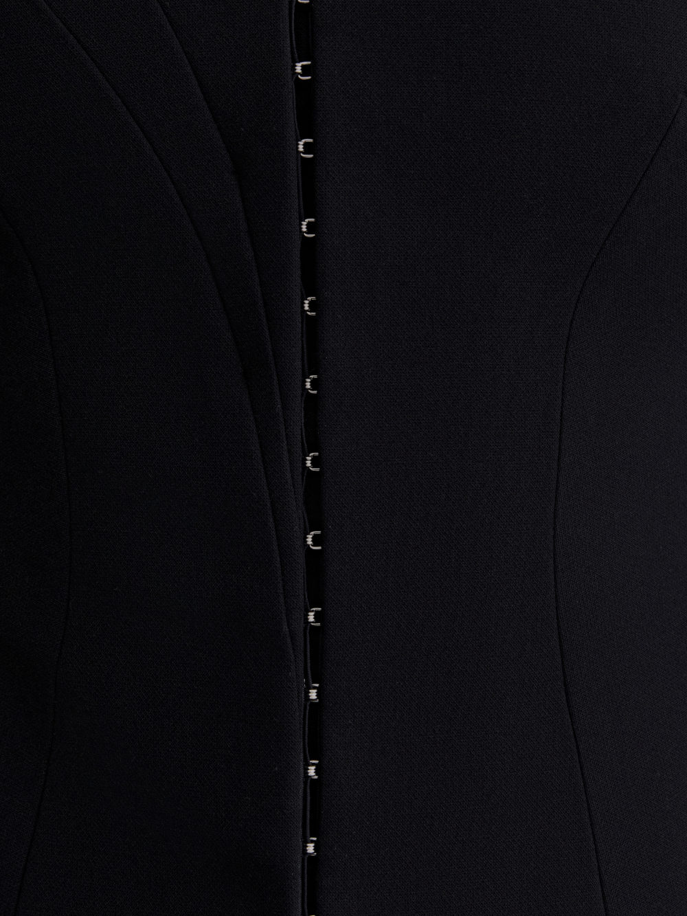 PRAS corseted jacket, hook fastening detail