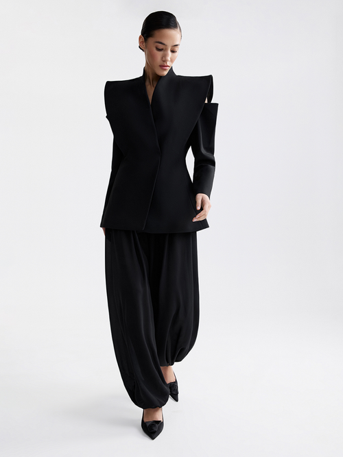Black tailored jacket with extended shoulder line