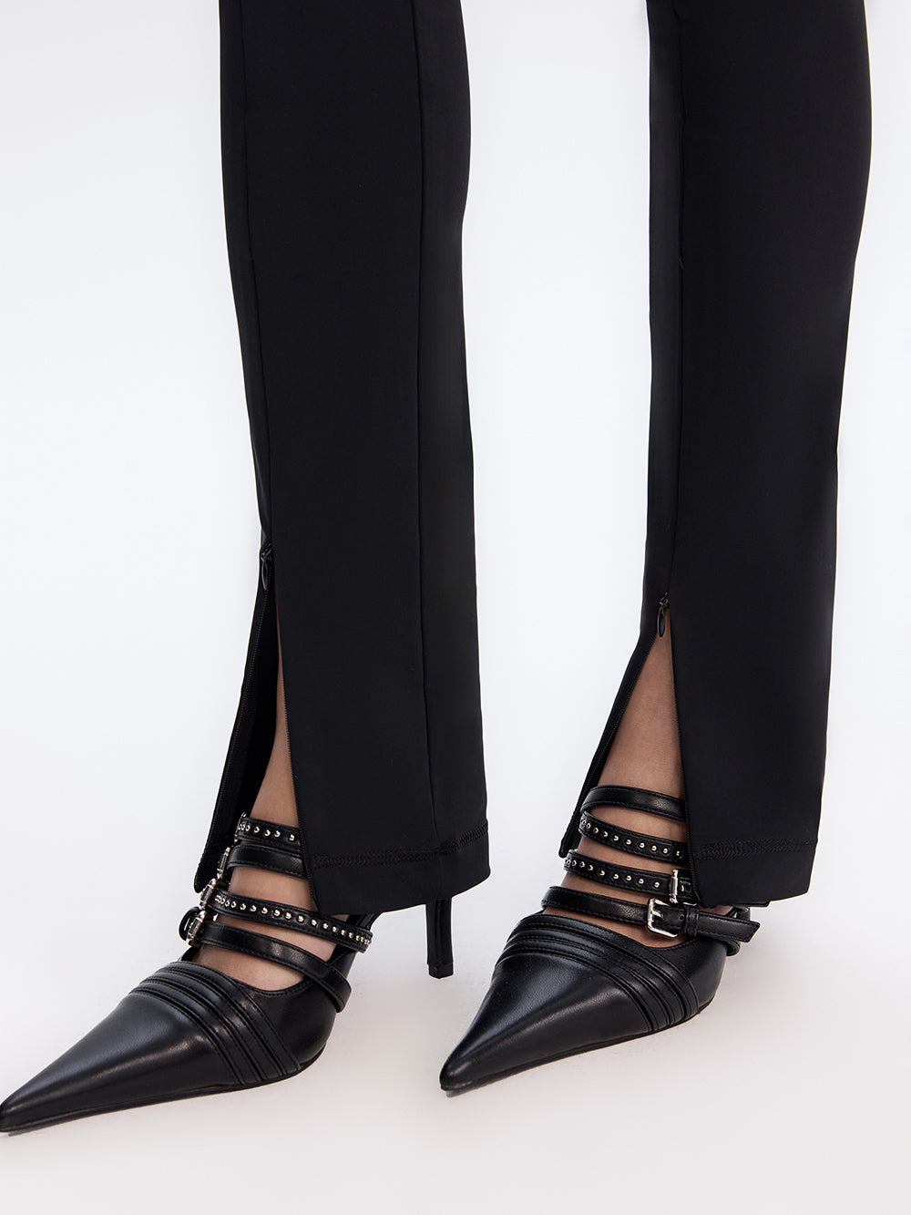 PRAS zip slit leggings, hem detail with heels