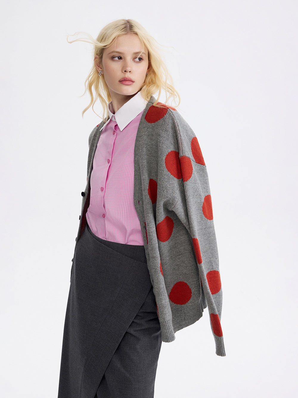 PRAS contrast collar shirt in pink check, layered with a cardigan