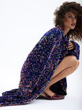 PRAS purple sequin maxi coat, seated, fabric detail