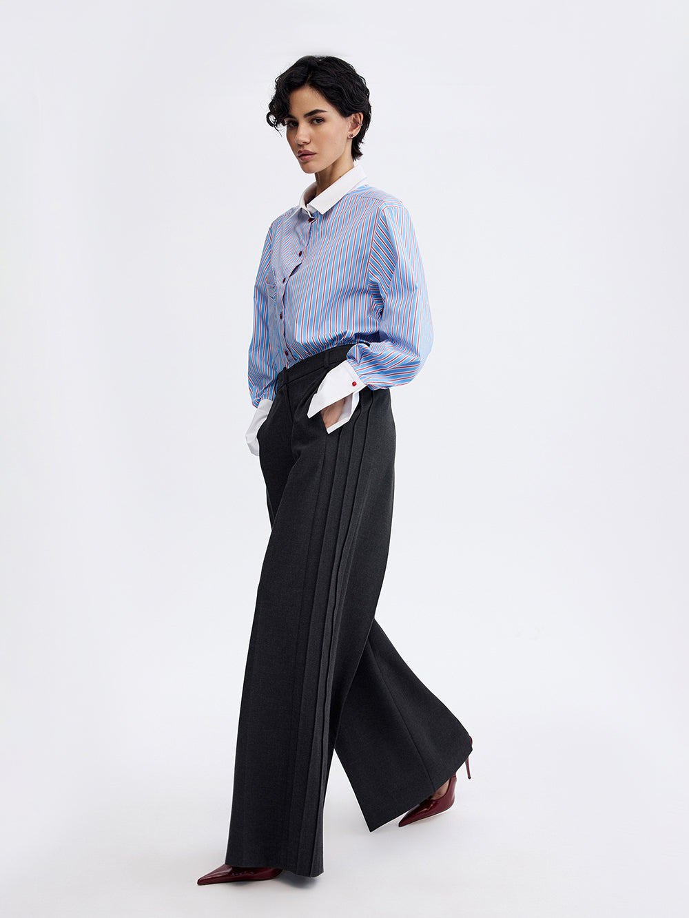 PRAS relief palazzo trousers in dark grey, walking