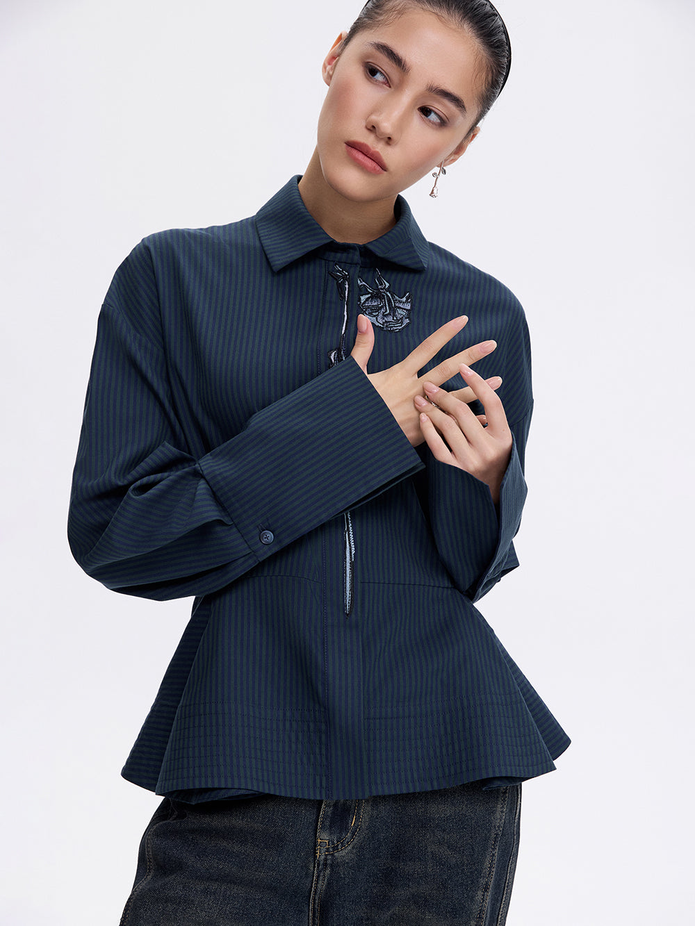 PRAS rose peplum shirt, three-quarter front