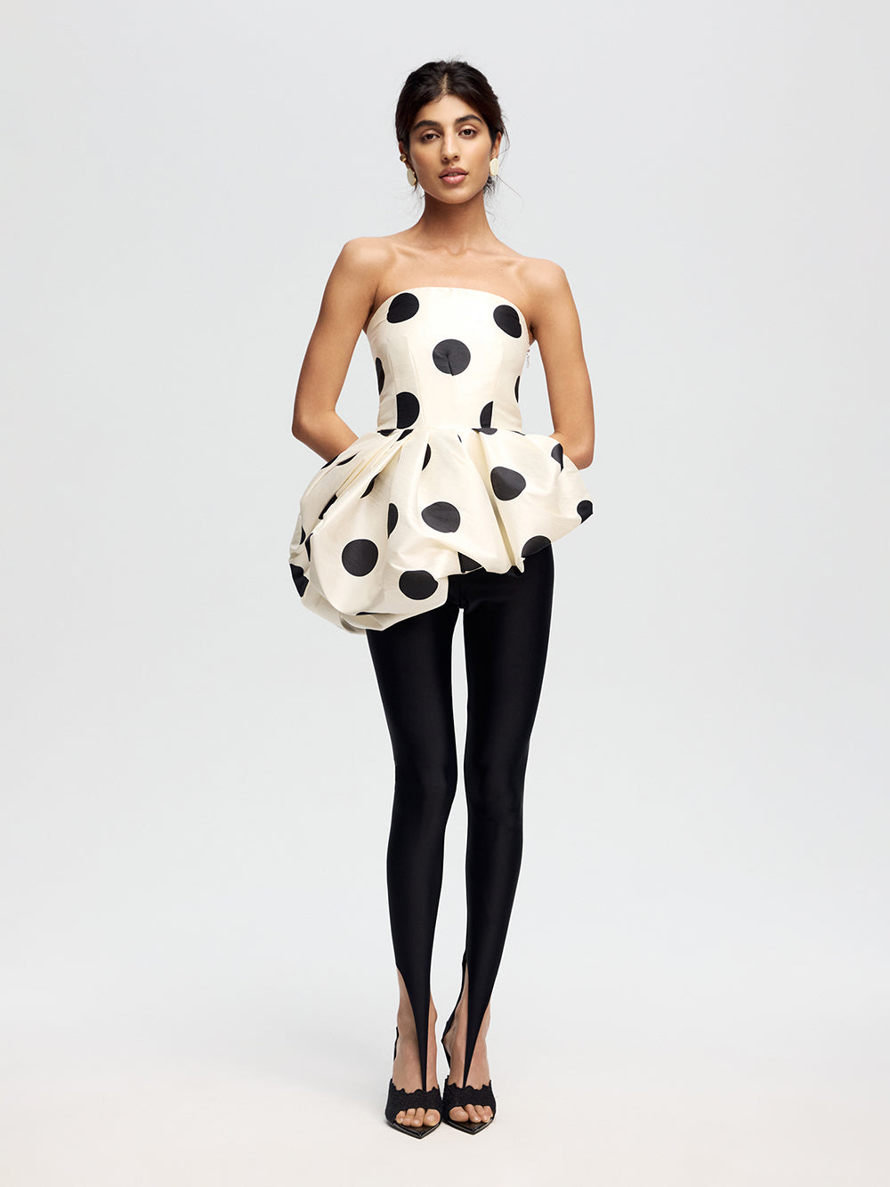 Top with an asymmetrical peplum